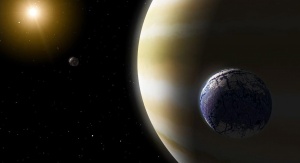 Impresja artystyczna – egzoksiężyc przypominający Ziemię orbituje wokół wielkiej gazowej planety. Credit: NASA/JPL-Caltech