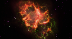 Mgławica Kraba - obraz z nałożonymi na siebie trzema typami promieniowania. Składa się ze światła podczerwonego (czerwone na zdjęciu), światła widzialnego (zielone) i ultrafioletowego (fioletowe). Foto: J. Graves.