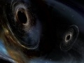 Dwie łączące się czarne dziury (impresja artystyczna). LIGO/Caltech/MIT/Sonoma State (Aurore Simonnet)