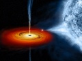 Czarna dziura zasysająca materię z nieodległego obiektu - artystyczna wizualizacja. Credit: NASA, CXC, M. Weiss