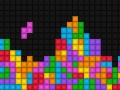 Kolorowe kostki na czarnym tle wzorowane na grze komputerowej "Tetris" | fot. Fotolia 