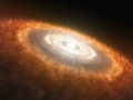 Młoda gwiazda otoczona dyskiem protoplanetarnym, w którym formują się planety - impresja artystyczna